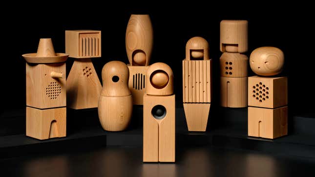 The Teenage Engineering wooden choir dolls photographed on a black background.