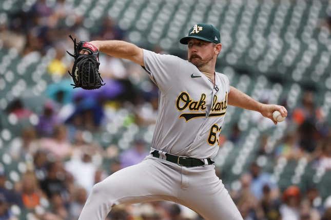 Jul 6, 2023; Detroit, Michigan, USA;  Oakland Athletics relief pitcher Hogan Harris (63) pitches in the first inning against the Detroit Tigers at Comerica Park.