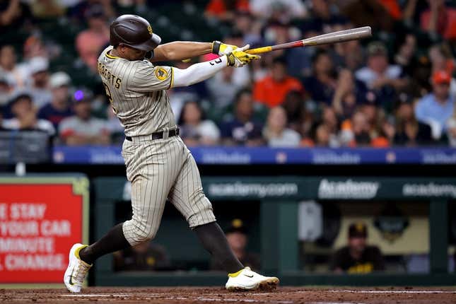 Sep 8, 2023; Houston, Texas, USA; San Diego Padres shortstop Xander Bogaerts (2) hits a home run to left field against the Houston Astros during the third inning at Minute Maid Park.