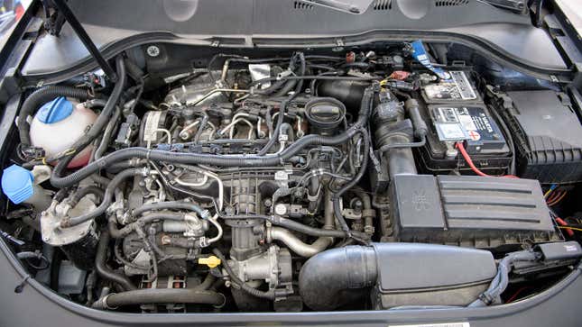 A photo of the engine bay in a modern car. 