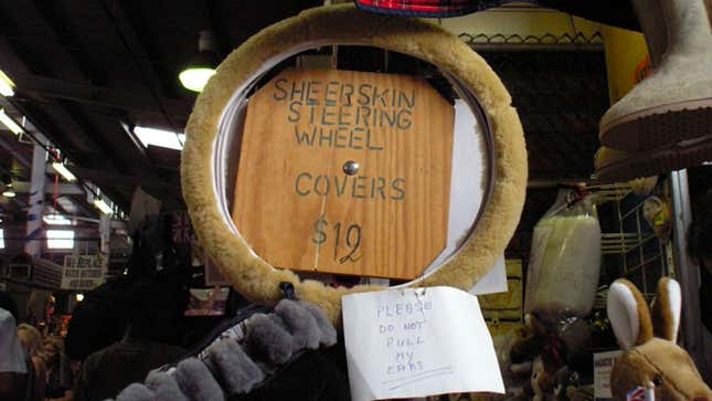 A fluffy steering wheel cover on sale in a market. 