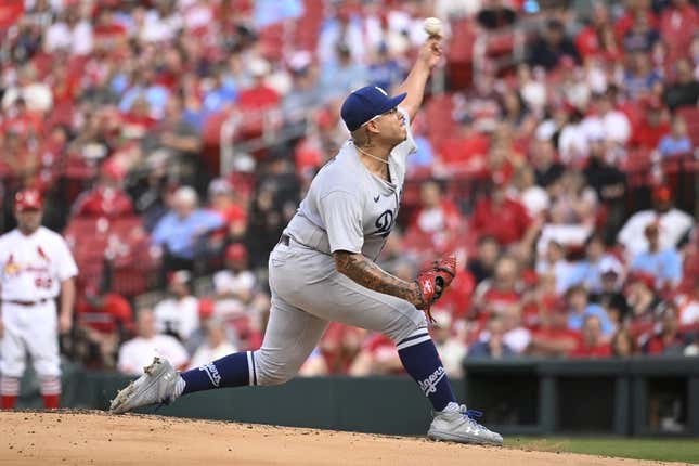 May 18, 2023; St. Louis, Missouri, USA; Los Angeles Dodgers starting pitcher Julio Urias (7) pitches against the St. Louis Cardinals in the first inning at Busch Stadium.