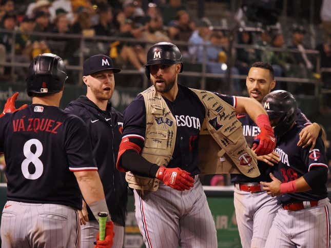 Jul 14, 2023; Oakland, California, USA; Minnesota Twins  left fielder Joey Gallo (13) celebrates with teammates after hitting a two-run home run Oakland Athletics during the ninth inning at Oakland-Alameda County Coliseum.