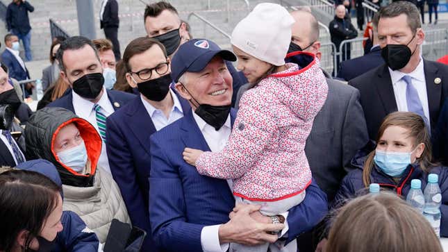 President Joe Biden meets with Ukrainian refugees during a visit to PGE Narodowy Stadium, March 26, 2022, in Warsaw.