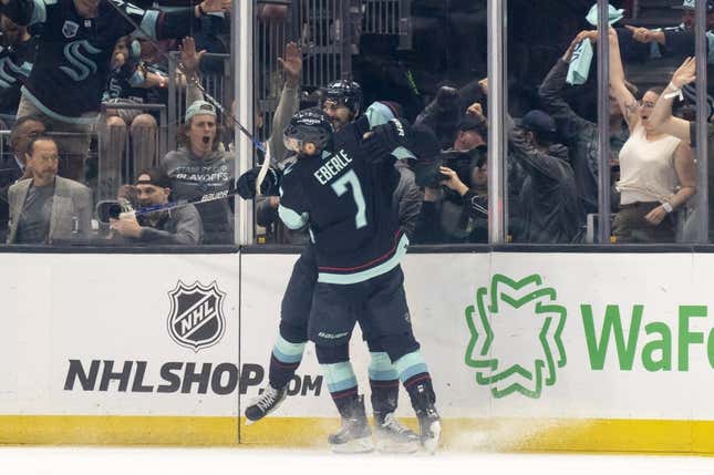 May 13, 2023; Seattle, Washington, USA; Seattle Kraken forward Matty Beniers (10) is congratulated by forward Jordan Eberle (7) after scoring a goal against the Dallas Stars during the third period in game six of the second round of the 2023 Stanley Cup Playoffs at Climate Pledge Arena.