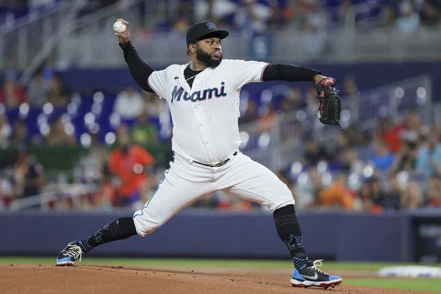 Aug 15, 2023; Miami, Florida, USA;  Miami Marlins starting pitcher Johnny Cueto (47) delivers a pitch against the Houston Astros during the first inning at loanDepot Park.