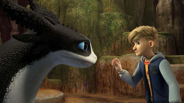 A young boy in a hoodie approaches a black-and-white Night Fury dragon.