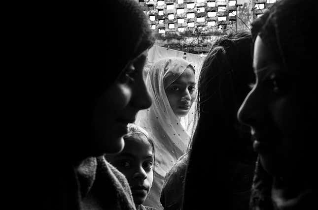 Farheen, 15, wears a real silver-cast Mukaish dupatta made by her father, a 65-year-old artisan, at Deorhi Agha Meer, Chandi Khana, Old Lucknow.