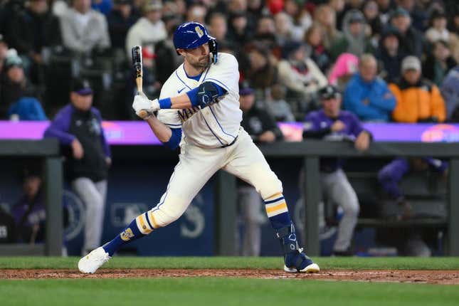 Apr 16, 2023; Seattle, Washington, USA; Seattle Mariners left fielder AJ Pollock (8) waits for the pitch against the Colorado Rockies at T-Mobile Park.