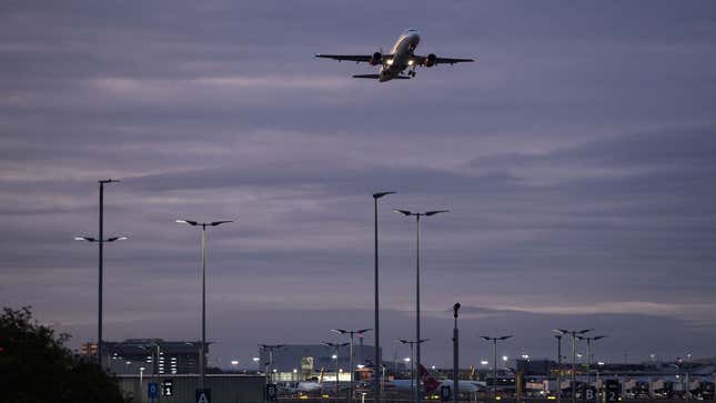 A passenger plane takes off from London Heathrow Airport 