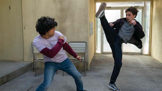 Robby and Miguel fighting.