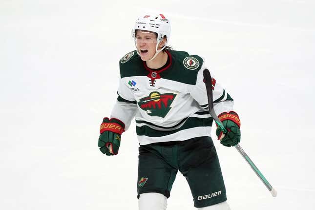 Mar 11, 2023; San Jose, California, USA; Minnesota Wild left wing Matt Boldy (12) reacts after a goal by left wing Marcus Johansson (not shown) against the San Jose Sharks during the third period at SAP Center at San Jose.