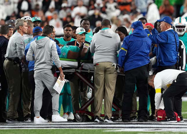 Tua Tagovailoa is carted off the field after a horrendous head injury on Thursday.