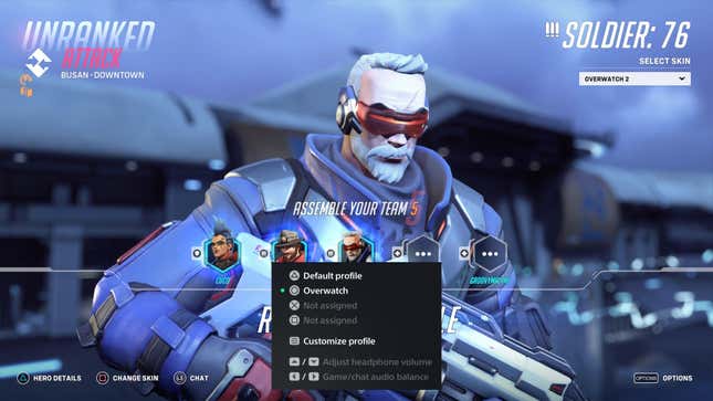 The hero select screen from Overwatch 2 is shown, with Soldier: 76 being selected and standing in the center. Overlapping the game is the DualSense's controller profile select screen, which includes the Default profile, and a second profile named for Overwatch.