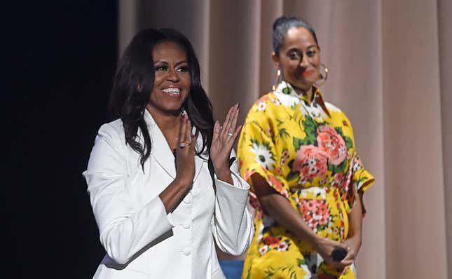 Former First Lady and author Michelle Obama appears onstage with Tracee Ellis Ross at Becoming: An Intimate Conversation with Michelle Obama at the Forum on November 15, 2018 in Inglewood, Calif.