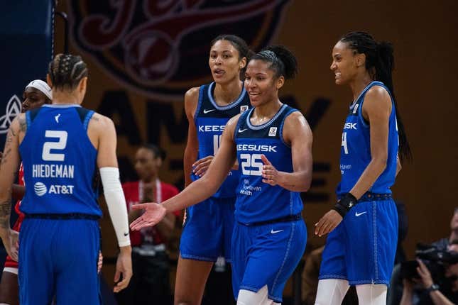 May 19, 2023; Indianapolis, Indiana, USA; Connecticut Sun forward Alyssa Thomas (25) celebrates a and one with teammates in the second half against the Indiana Fever at Gainbridge Fieldhouse.