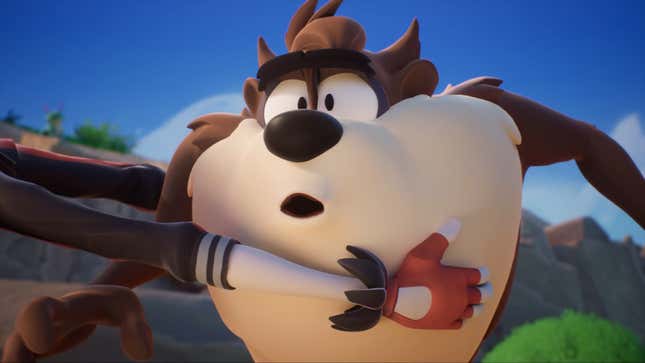 Looney Tunes character Taz is grabbed by someone off-screen.