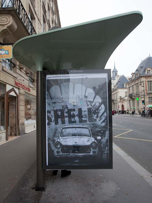 Image for article titled Photos: These subversive ads rip into the corporate sponsors of the Paris climate talks