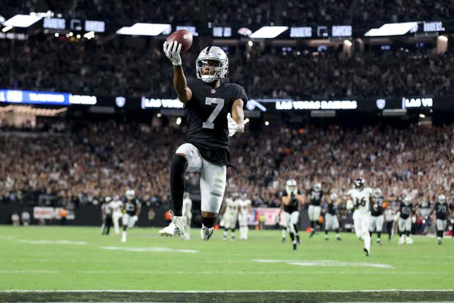 Zay Jones #7 of the Las Vegas Raiders celebrates after scoring the game-winning touchdown in overtime to defeat the Baltimore Ravens 33-27 at Allegiant Stadium on September 13, 2021 in Las Vegas, Nevada. 