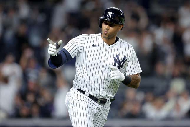 May 8, 2023;  Bronx, New York, USA;  New York Yankees left fielder Aaron Hicks (31) rounds the bases after hitting a two-run home run against the Oakland Athletics in the seventh inning at Yankee Stadium.