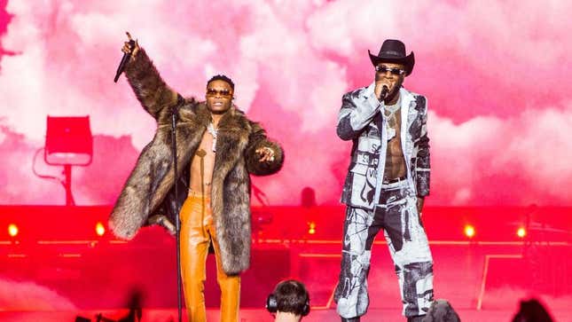 Wizkid and Burna Boy perform at The O2 Arena on December 01, 2021 in London, England. 