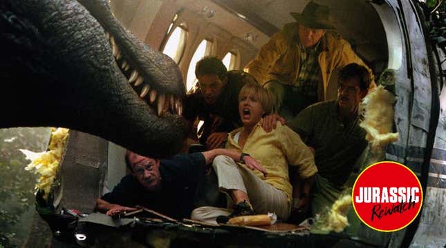 A dinosaur terrorizes the cast in a plane.