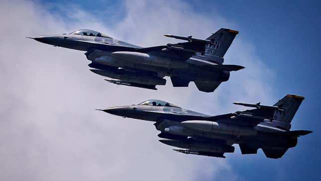 U.S. Air Force F16 fighter jets fly in formation during U.S.-Philippines joint air force exercises dubbed Cope Thunder at Clark Air Base on May 09, 2023 in Mabalacat, Pampanga province, Philippines.