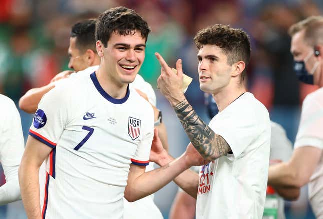 Giovanni Reyna , left, and Christian Pulisic will miss three games for USMNT’s in the World Cup qualifiers.