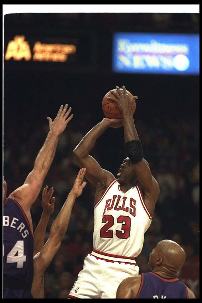 Guard Michael Jordan of the Chicago Bulls goes up for two during Game Four of the NBA finals at the America West Arena in Phoenix, Arizona.