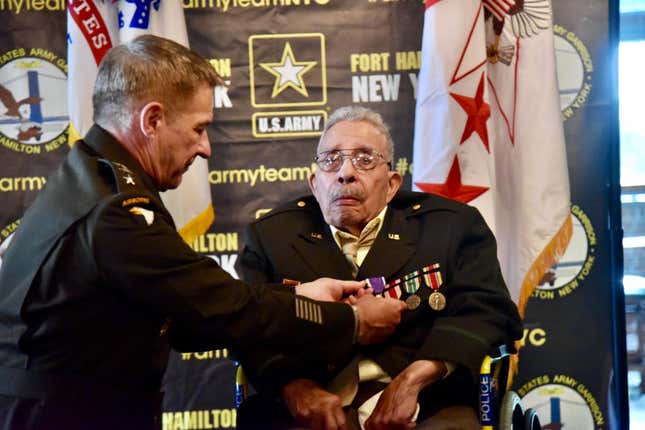 Ozzie Fletcher is pinned with the Purple Heart during a Friday ceremony in Brooklyn. 