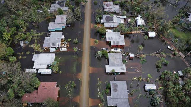 In this aerial view, flooded homes are shown after Hurricane Ian moved through the Gulf Coast of Florida on September 29, 2022 in Port Charlotte, Florida.