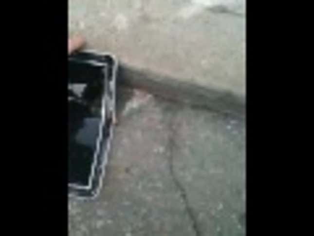 Crazy Guy Smashes iPad With Baseball Bat