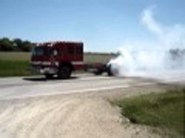 Watch a firetruck lay down a massive smokey burnout