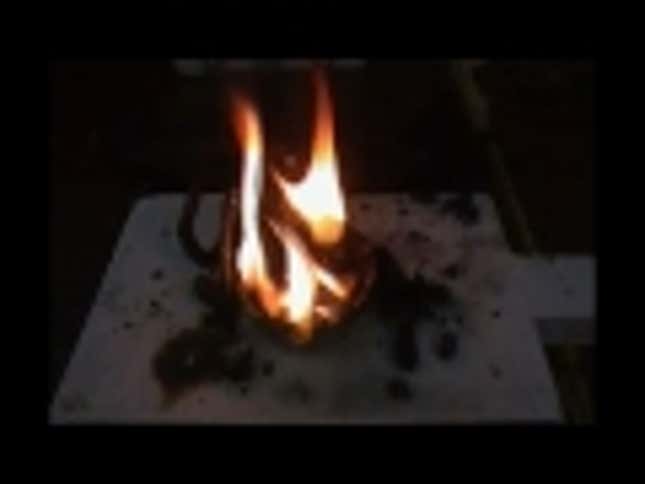 Watch a Red Hot Nickel Ball Light Up a Bowl of Black Snake Fireworks