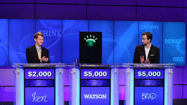 A photo of Watson competing against two humans on Jeopardy.
