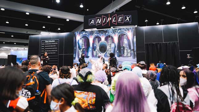 A Photo Shows Fans Attending An Aniplex Panel At Anime Expo.