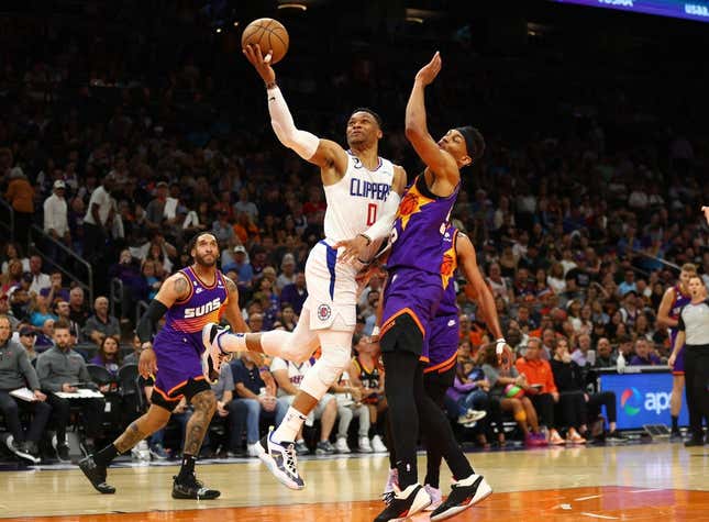 Apr 9, 2023; Phoenix, Arizona, USA; Los Angeles Clippers guard Russell Westbrook (0) drives to the basket against the Phoenix Suns in the first half at Footprint Center.