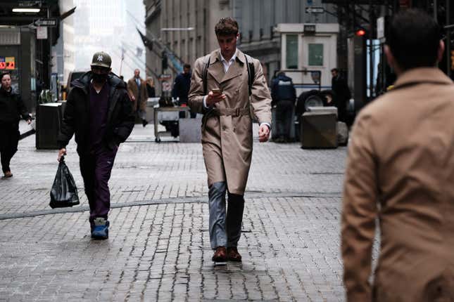 NEW YORK, NEW YORK - MAY 02: People walk along Wall Street near the New York Stock Exchange (NYSE) on May 02, 2022 in New York City. 