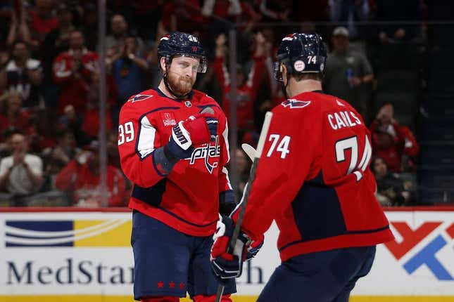 Mar 23, 2023; Washington, District of Columbia, USA; Washington Capitals right wing Anthony Mantha (39) celebrates with Capitals defenseman John Carlson (74) after scoring a goal during the first period against the Chicago Blackhawks at Capital One Arena.
