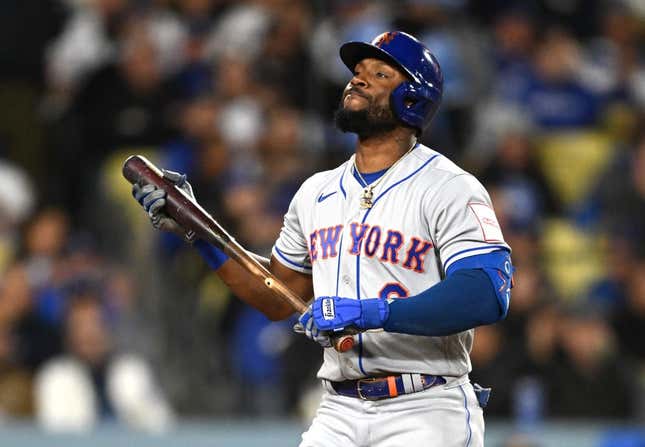 April 18, 2023;  Los Angeles, California, USA;  New York Mets right fielder Starling Marte (6) reacts after being knocked out in the third inning against the Los Angeles Dodgers at Dodger Stadium.