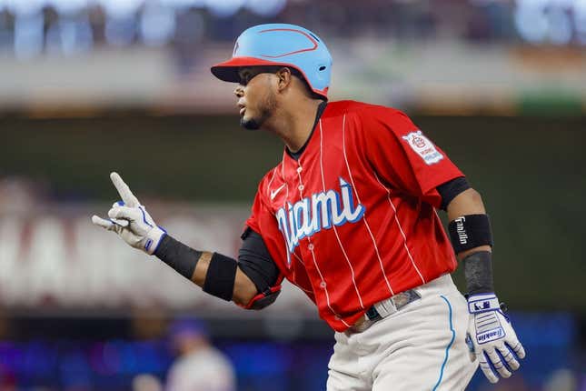 Apr 1, 2023; Miami, Florida, USA; Miami Marlins second baseman Luis Arraez (3) reacts from first base after a base hit during the second inning against the New York Mets at loanDepot Park.