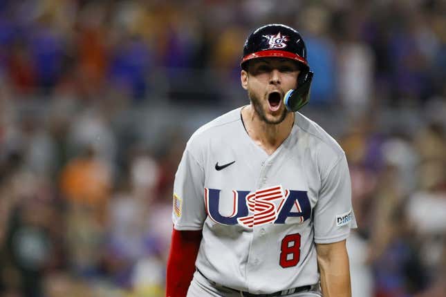 Mar 18, 2023; Miami, Florida, USA; USA shortstop Trea Turner (8) reacts after hitting a grand slam during the eighth inning against Venezuela at LoanDepot Park.