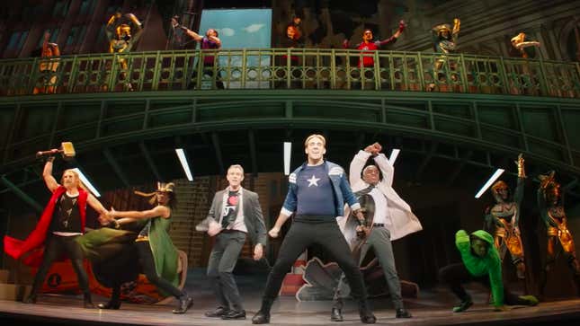 Performers dressed as the Avengers pose onstage during Rogers: The Musical, as seen in Disney+ series Hawkeye.