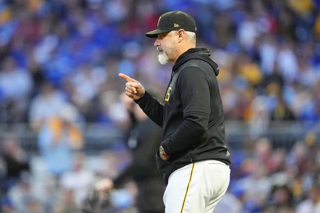 May 5, 2023; Pittsburgh, Pennsylvania, USA; Pittsburgh Pirates manager Derek Shelton (17) signals for a pitching change during the sixth inning against the Toronto Blue Jays at PNC Park.
