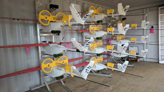 Zipline “Zip” drones waiting for a delivery order.