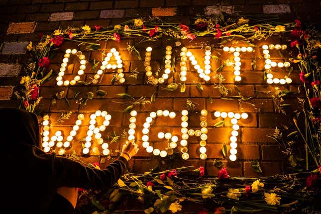 A display of candles and flowers spells the name of Daunte Wright at a protest over his death on April 12, 2021, in Seattle, Washington. Wright, a Black man whose car was stopped in Brooklyn Center, Minnesota on Sunday reportedly for expired registration, and not far from where George Floyd was killed during an arrest in Minneapolis last May, was shot and killed by an officer who police say mistook her service revolver for a Taser.
