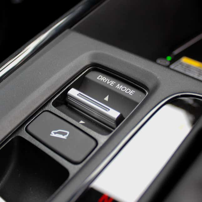 A photo of the drive mode selector on a Honda CR-V Hybrid SUV.