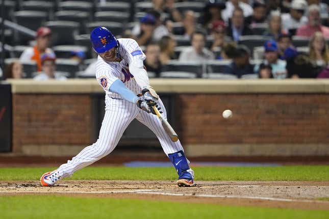 Sep 13, 2023; New York City, New York, USA; New York Mets first baseman Pete Alonso (20) hits an RBI single against the Arizona Diamondbacks during the first inning at Citi Field.