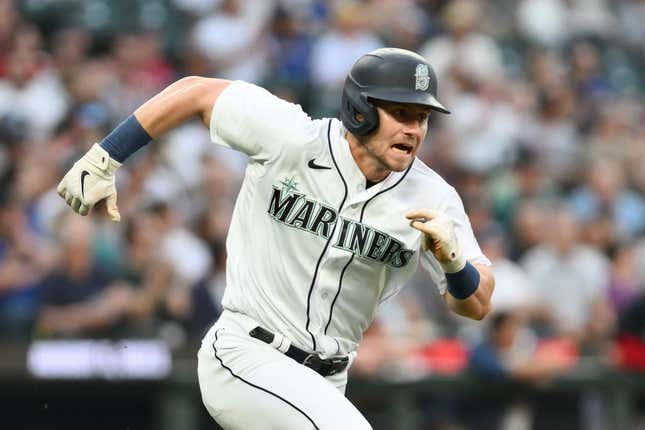 Jul 19, 2023; Seattle, Washington, USA; Seattle Mariners left fielder Jarred Kelenic (10) runs toward first base after hitting a single against the Minnesota Twins during the seventh inning at T-Mobile Park.