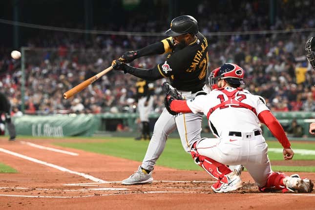 Apr 3, 2023; Boston, Massachusetts, USA; Pittsburgh Pirates right fielder Canaan Smith-Njigba (28) hits a two-run home run against the Boston Red Sox during the first inning at Fenway Park.